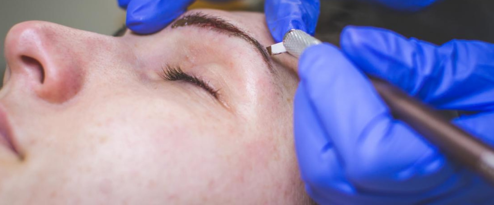 What is the side effect of eyebrow tattooing?